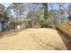 Large backyard with a fence is ready for outdoor enjoyment and activities at 1749 Lauranceae Way, Riverdale, GA 30296