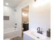 Updated bathroom features modern fixtures and clean design at 1749 Lauranceae Way, Riverdale, GA 30296