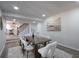 Dining room with hardwood floors, modern decor, and seating for six at 1749 Lauranceae Way, Riverdale, GA 30296