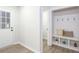 Entryway with a mudroom bench, hooks for coats, and storage for shoes and other items at 1749 Lauranceae Way, Riverdale, GA 30296
