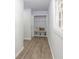 Hallway with a mudroom bench, hooks for coats, and a storage area at 1749 Lauranceae Way, Riverdale, GA 30296