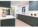 Renovated kitchen with shaker cabinets, stainless appliances, and ample counter space at 3402 Wynnewood Ln, Duluth, GA 30096