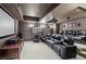 Home theater with comfortable seating, a projector, and a large screen for entertainment at 770 Spalding Heights Dr, Atlanta, GA 30350