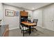 Functional home office featuring modern desk, chair, shelving, and ample natural light at 770 Spalding Heights Dr, Atlanta, GA 30350