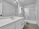 This bathroom is equipped with a large mirror and shower at 140 Ashewoode Downs Ln, Johns Creek, GA 30005