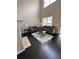 Spacious living room features high ceilings, dark hardwood floors, and neutral decor at 1643 Jackson Nw Way, Atlanta, GA 30318