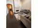 Open-concept living room with fireplace and hardwood floors at 1643 Jackson Nw Way, Atlanta, GA 30318