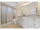 Bathroom with a combination tub/shower, and a vanity with granite countertop at 390 Wilde Green Dr, Roswell, GA 30075