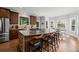 Spacious kitchen with granite countertops, stainless steel appliances, and breakfast nook at 390 Wilde Green Dr, Roswell, GA 30075