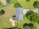 An aerial view of the home showing the roof and yard at 58 6Th W Ave, Dallas, GA 30157