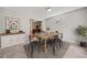 Dining area featuring a wooden table, modern chairs, and stylish decor at 58 6Th W Ave, Dallas, GA 30157