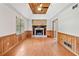 Bright living room with a stone fireplace and hardwood floors at 58 6Th W Ave, Dallas, GA 30157