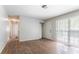 Bright bedroom features wood floors, closet, and a large window letting in natural light at 4337 Brookside Dr, Forest Park, GA 30297