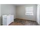 This bedroom features wood floors, a vanity, closet and natural light at 4337 Brookside Dr, Forest Park, GA 30297