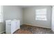 This bedroom features wood floors, a vanity and natural light at 4337 Brookside Dr, Forest Park, GA 30297