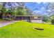 Charming brick home with a lush green lawn, offering a welcoming curb appeal at 4337 Brookside Dr, Forest Park, GA 30297