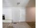 This living room features a fireplace, neutral walls, and a white door at 4337 Brookside Dr, Forest Park, GA 30297