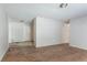 Spacious living room featuring neutral paint, wood floors, base trim, and natural light at 4337 Brookside Dr, Forest Park, GA 30297