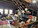 Spacious attic with exposed beams, three windows and plenty of room for storage at 472 Parkway Ne Dr, Atlanta, GA 30308