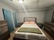 Cozy bedroom featuring neutral tones, ample closet space, and comfortable bedding at 472 Parkway Ne Dr, Atlanta, GA 30308