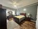 Bedroom with wood floors, neutral paint, and ample natural light at 472 Parkway Ne Dr, Atlanta, GA 30308