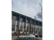 Modern townhouses with balconies, large windows, and gray and white facade, street view at 472 Parkway Ne Dr, Atlanta, GA 30308