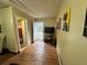 Welcoming hallway with clean finishes and ample lighting, leading to various rooms at 472 Parkway Ne Dr, Atlanta, GA 30308