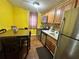 The well-equipped kitchen is adorned with sleek appliances and hardwood floors at 472 Parkway Ne Dr, Atlanta, GA 30308