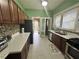 Kitchen with stainless steel appliances, tiled backsplash, and ample counter space at 472 Parkway Ne Dr, Atlanta, GA 30308
