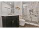 Modern bathroom features a luxurious glass shower with marble tiles and stylish fixtures at 855 Peachtree Ne St # 1108, Atlanta, GA 30308