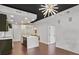 Open-concept kitchen showcasing a marble island, stainless steel appliances, and modern lighting fixture at 855 Peachtree Ne St # 1108, Atlanta, GA 30308