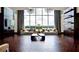 Expansive living room offers stunning city views, hardwood floors, and elegant furnishings at 855 Peachtree Ne St # 1108, Atlanta, GA 30308