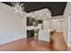 Stylish interior view into the open floor plan showing the kitchen, island, and cabinetry at 855 Peachtree Ne St # 1108, Atlanta, GA 30308