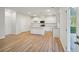 Open concept kitchen featuring granite counters, center island, and stainless appliances at 11857 Rizvan Pl, Covington, GA 30014