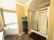 A well-lit bathroom with a tub, shower, and modern fixtures at 350 Glynnshire Ct, Covington, GA 30016