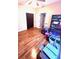 A cluttered bedroom featuring hardwood floors, a closet and natural light at 350 Glynnshire Ct, Covington, GA 30016