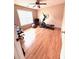 A bedroom features hardwood floors, a ceiling fan and natural light at 350 Glynnshire Ct, Covington, GA 30016
