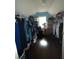 A spacious walk-in closet with organized storage solutions and natural light at 350 Glynnshire Ct, Covington, GA 30016