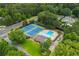 Aerial view of the community pool and tennis courts, perfect for recreation and relaxation at 505 Junction Pt, Roswell, GA 30075