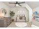 Serene Bedroom with crib, changing table, decorative tree, and charming book display at 505 Junction Pt, Roswell, GA 30075