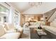 Bright living room with vaulted ceilings, hardwood floors, and easy access to the kitchen at 505 Junction Pt, Roswell, GA 30075