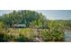 Beautiful aerial view of the community with river access and a covered community area at 7863 Kiverton Pl, Atlanta, GA 30350
