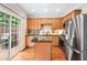 Well-equipped kitchen with stainless steel appliances and center island at 7863 Kiverton Pl, Atlanta, GA 30350