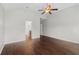 Bright, open bedroom showing vaulted ceiling and seamless flow to ensuite bathroom at 80 Pulaski Pl, Jonesboro, GA 30238