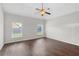 Bedroom featuring vaulted ceiling, ceiling fan, and natural light at 80 Pulaski Pl, Jonesboro, GA 30238