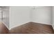 Bright living room with hardwood floors and ample space for furnishing at 80 Pulaski Pl, Jonesboro, GA 30238