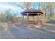Backyard gazebo with built-in seating, ideal for outdoor relaxation at 144 Morning Creek Rd, Jonesboro, GA 30238