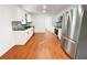 Bright kitchen featuring stainless steel refrigerator and modern mosaic backsplash at 144 Morning Creek Rd, Jonesboro, GA 30238