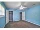 Cozy bedroom featuring carpet, windows and double closets at 24 Echo Ridge Dr, Powder Springs, GA 30127