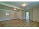 Bedroom with hardwood flooring, neutral walls, and recessed lighting at 24 Echo Ridge Dr, Powder Springs, GA 30127